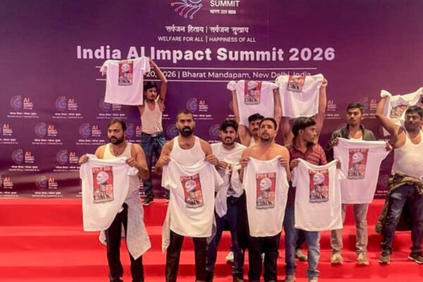 Shirtless protest at AI Summit